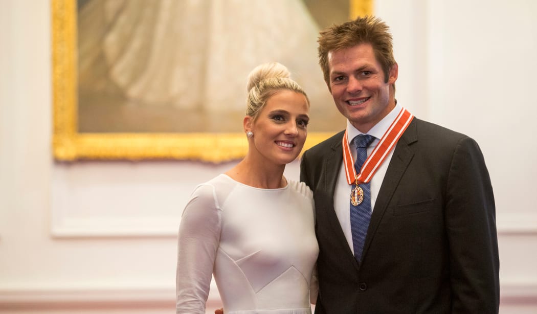 Former All Blacks captain, Richie McCaw and partner, Gemma Flynn, after he was awarded the the ONZ for services to New Zealand by the the Governor General, Lt Gen the Rt Hon Sir Jerry Mataparae, Government House, Wellington, New Zealand. Thursday, 14 April, 2016.
