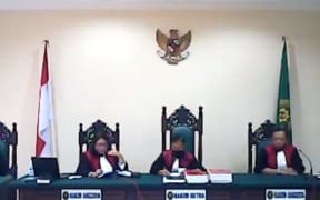 Judges in an Indonesian court in Kalimantan as they convicted and sentenced seven West Papuans on treason charges, 17 June 2020.