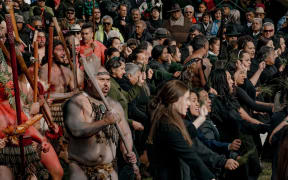 Tūhoe people perform a haka in Tāneatua.