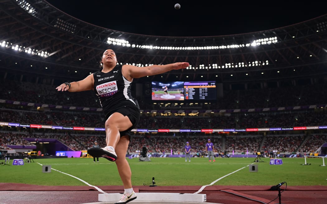Maddi Wesche competes in the women's shot put final at the athletics world championships in Tokyo.