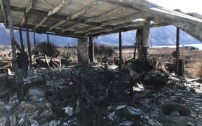 A fire-ravished home in Lake Ōhau Village.