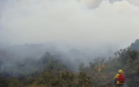 A photo captioned "fires brought under control in four nature reserves", posted by SERNANP on 24 November 2016.