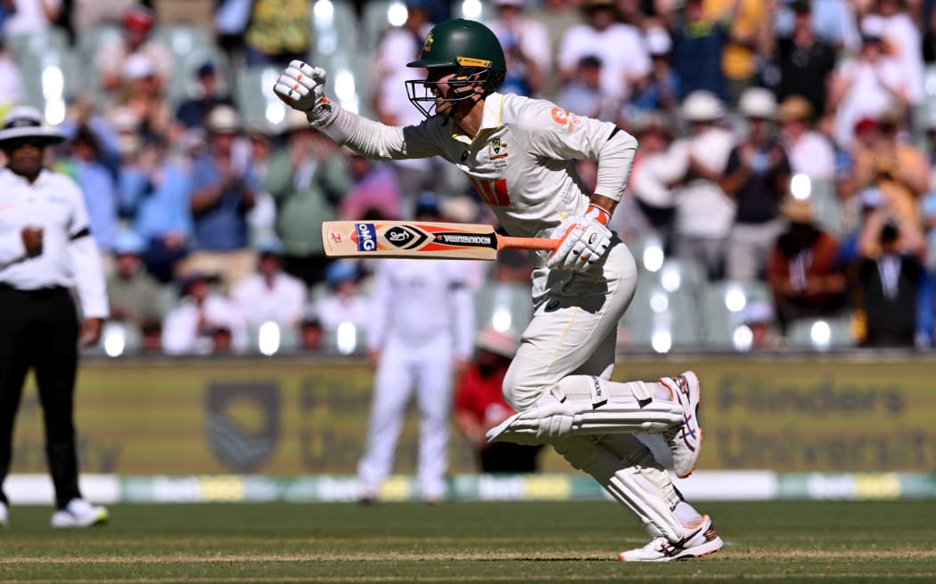 Australian batsman Alex Carey celebrates scoring a century on the first day of the third Ashes cricket Test match between Australia and England at the Adelaide Oval in Adelaide on December 17, 2025. (Photo by William WEST / AFP) / --IMAGE RESTRICTED TO EDITORIAL USE - STRICTLY NO COMMERCIAL USE--