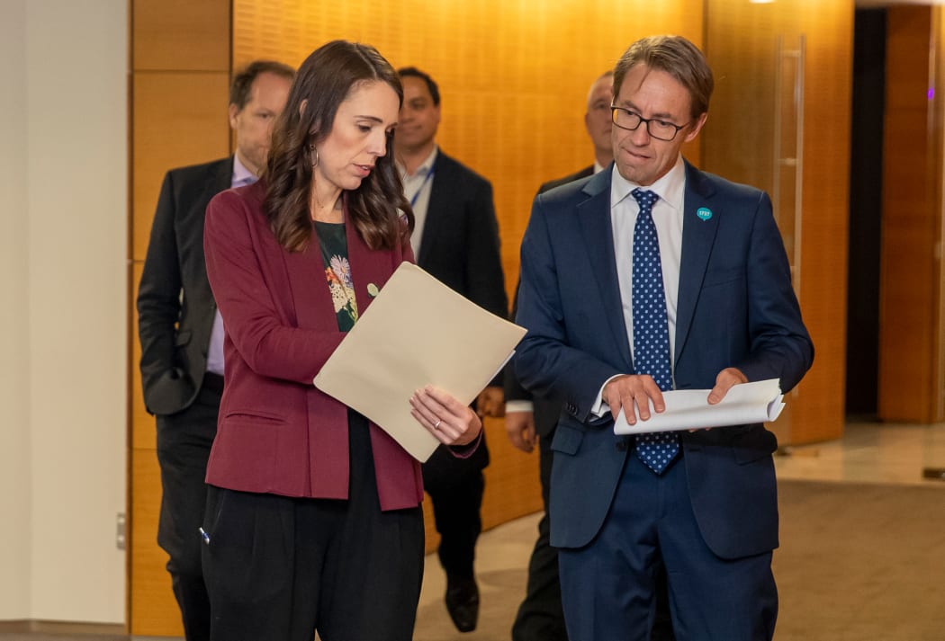 Prime Minister Jacinda Ardern and Director-General of Health Dr Ashley Bloomfield walking to a Covid-19 coronavirus briefing on 6 May, 2020.
