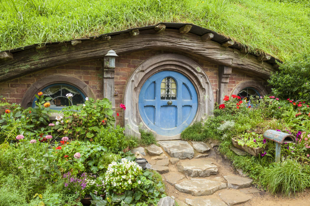 Wooden doors of Hobbit holes in the film set of Hobbiton in Matamata.