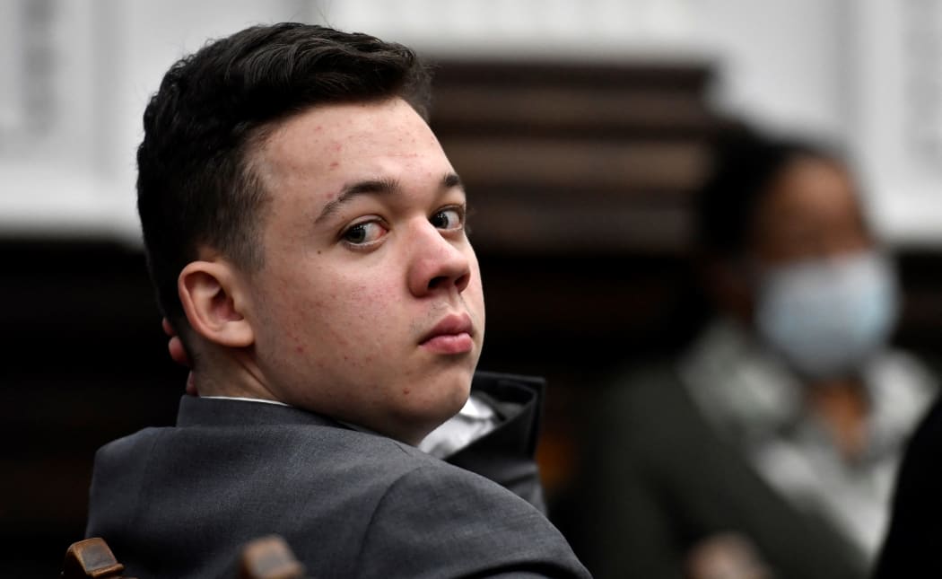 KENOSHA, WISCONSIN - NOVEMBER 12: Kyle Rtttenhouse looks back as attorneys argue about the charges that will be presented to the jury during proceedings at the Kenosha County Courthouse on November 12, 2021 in Kenosha, Wisconsin.