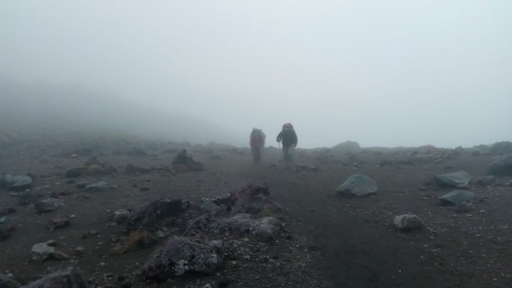 Trampers in the Tongariro mist