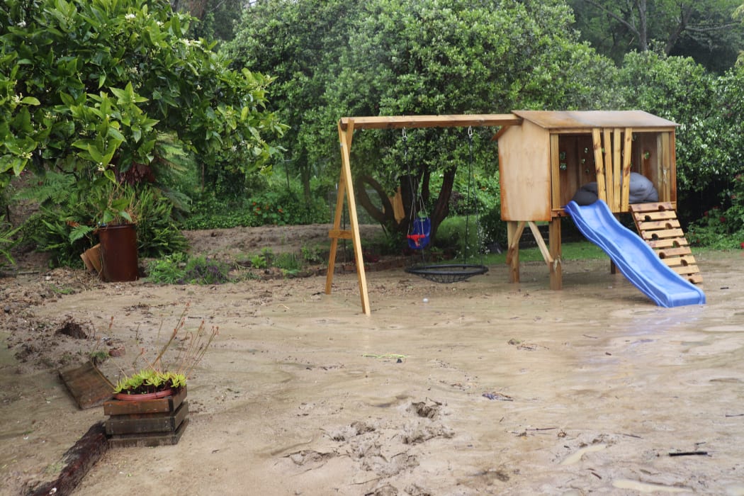 Katie Fitzpatrick’s backyard was covered with deep, thick silt after flooding in Gisborne.
