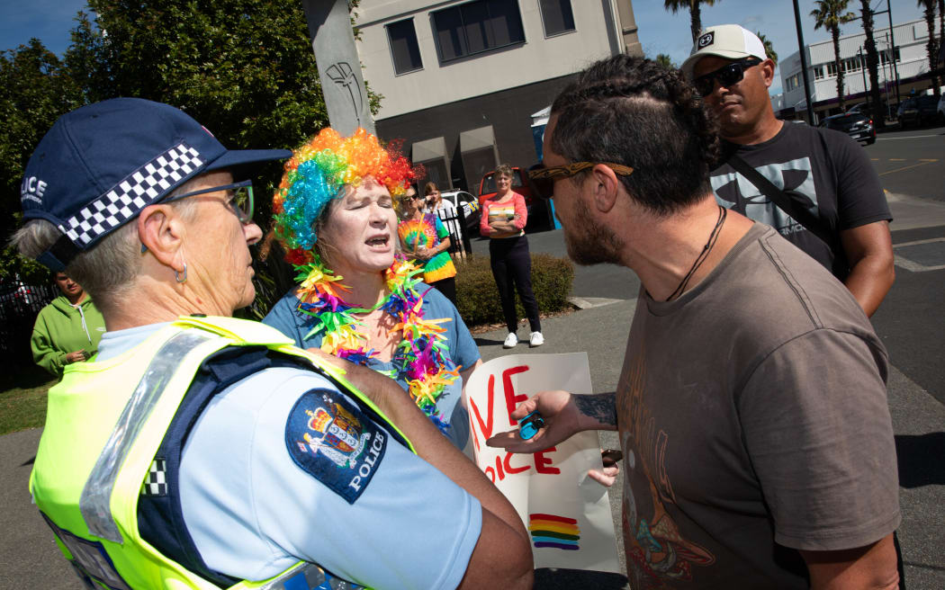 Destiny Church protesters and counter protesters from the rainbow community outside the Gisborne library on 26 March 2024.