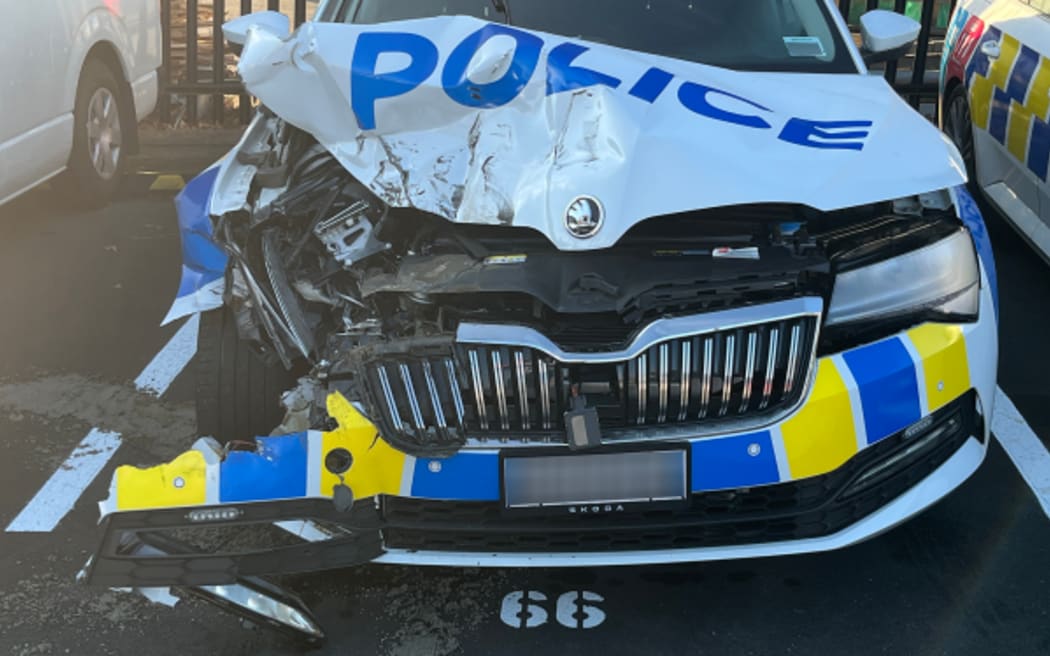 A man is facing serious charges after allegedly ramming a police car with a stolen vehicle in Auckland overnight Tuesday.