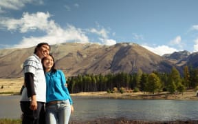Asian couple enjoying NZ scenary