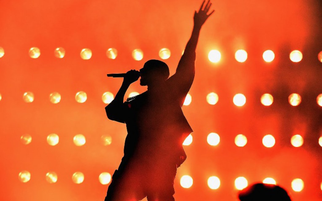 Kanye West performing in 2015.