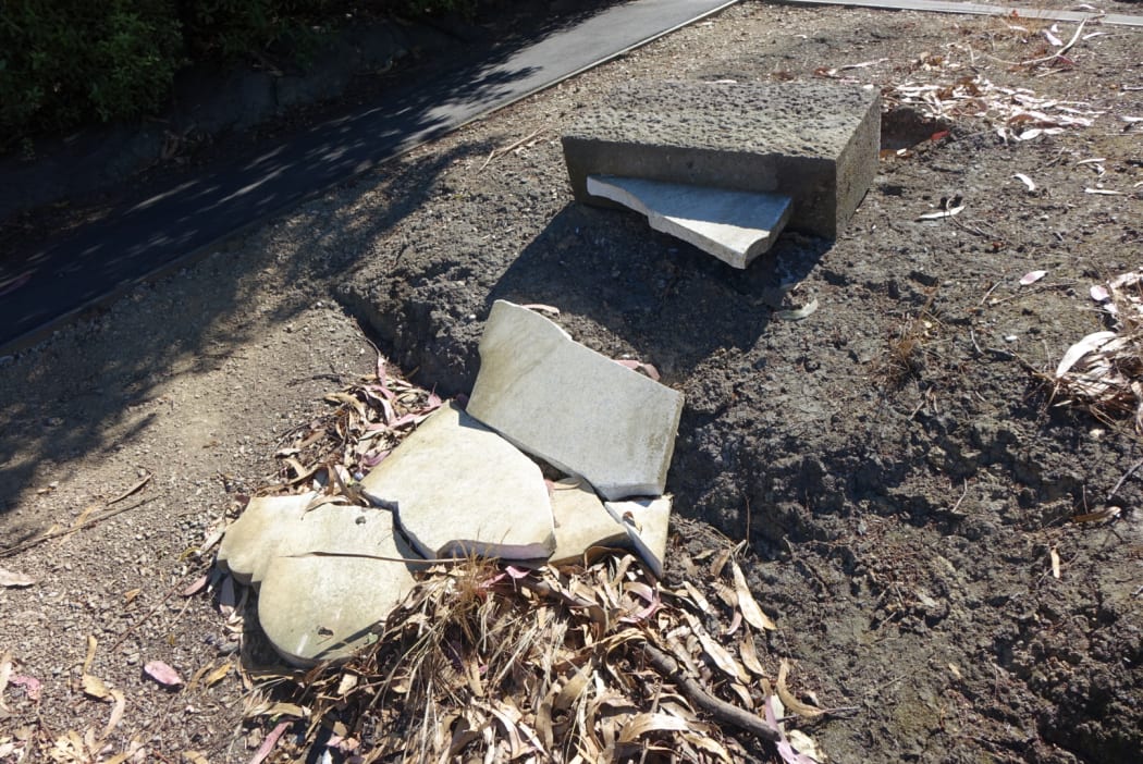 Another of the damaged graves at the cemetery.
