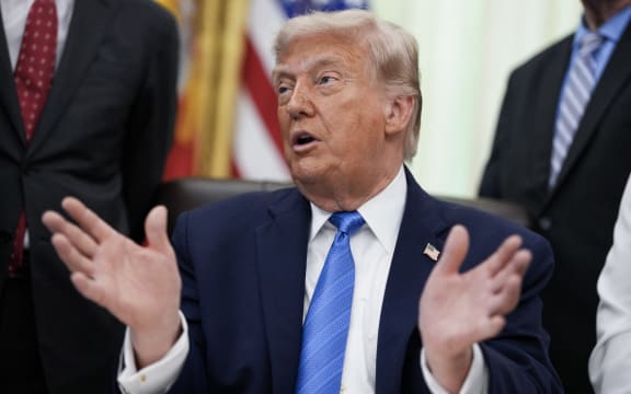 US President Donald Trump speaks during a signing ceremony for the "Secure America Act" in the Oval Office of the White House in Washington, DC, on June 10, 2026. The bill provides around $38 billion for Immigration and Customs Enforcement (ICE), $26 billion for Border Patrol and another $5 billion for unforeseen costs, effectively ensuring a steady flow of money for Trump's deportation agenda through fiscal 2029.