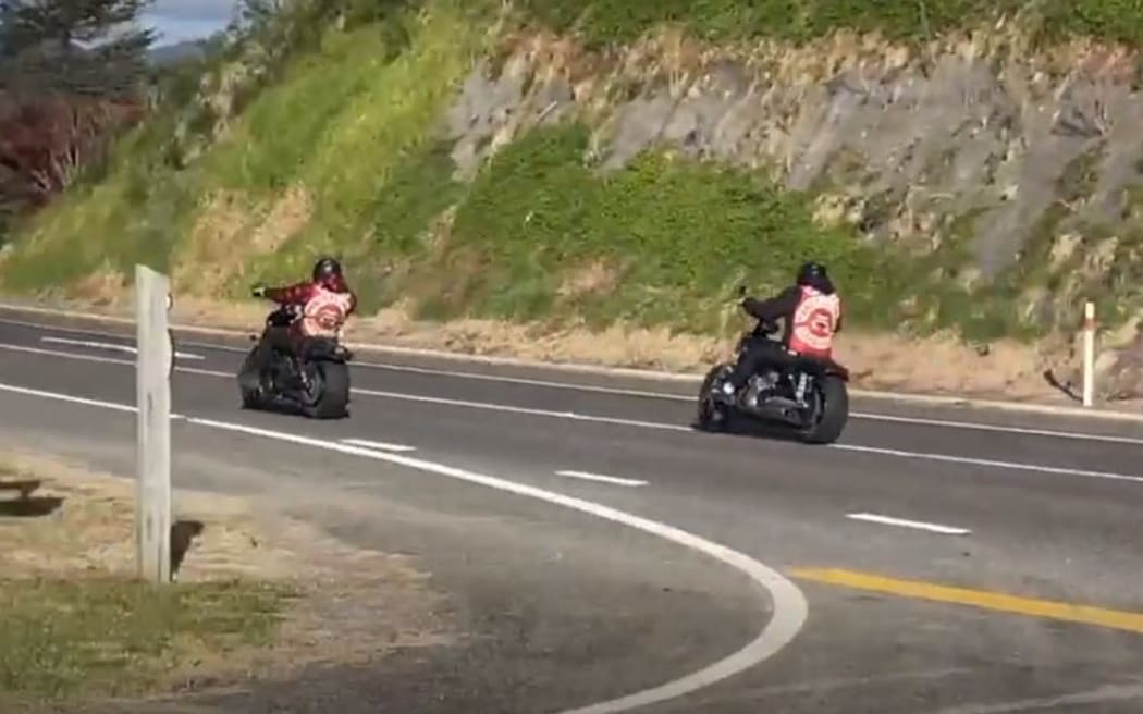 Gang members ride bikes in Ōpōtiki.