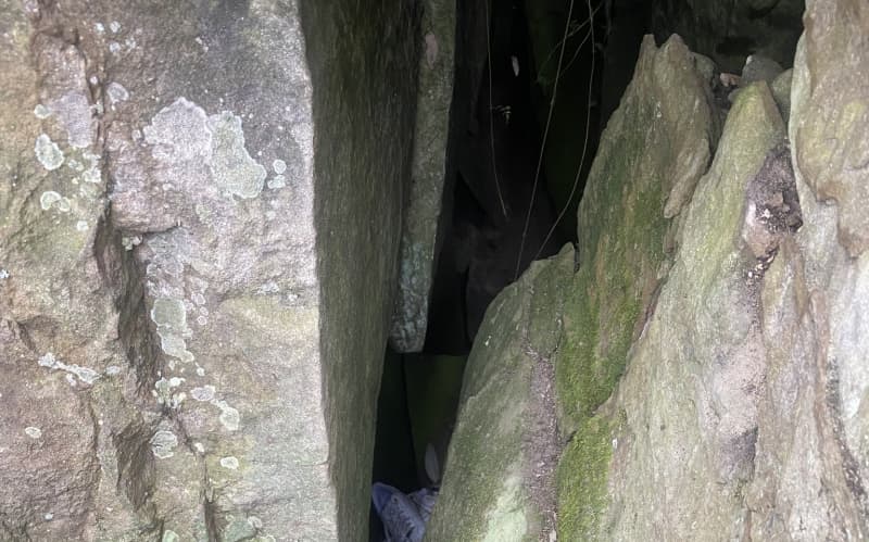 Woman wedged upside down between rocks for hours after trying to ...