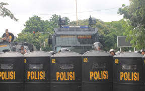 Indonesian police at a demonstration in the Papuan region