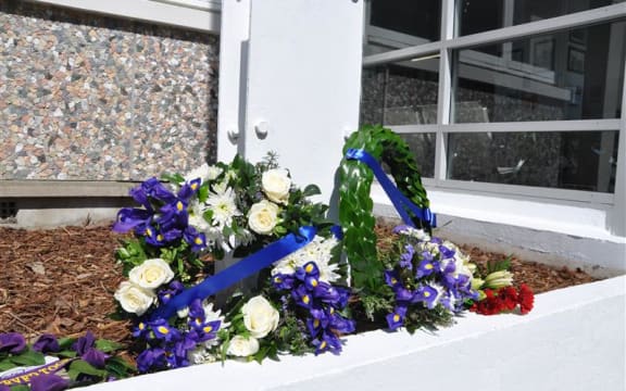 Wreaths placed by Police Commissioner Richard Chambers and Police Minister Mark Mitchell outside the Nelson Central Police Station to remember officers who've lost their lives in the line of duty.