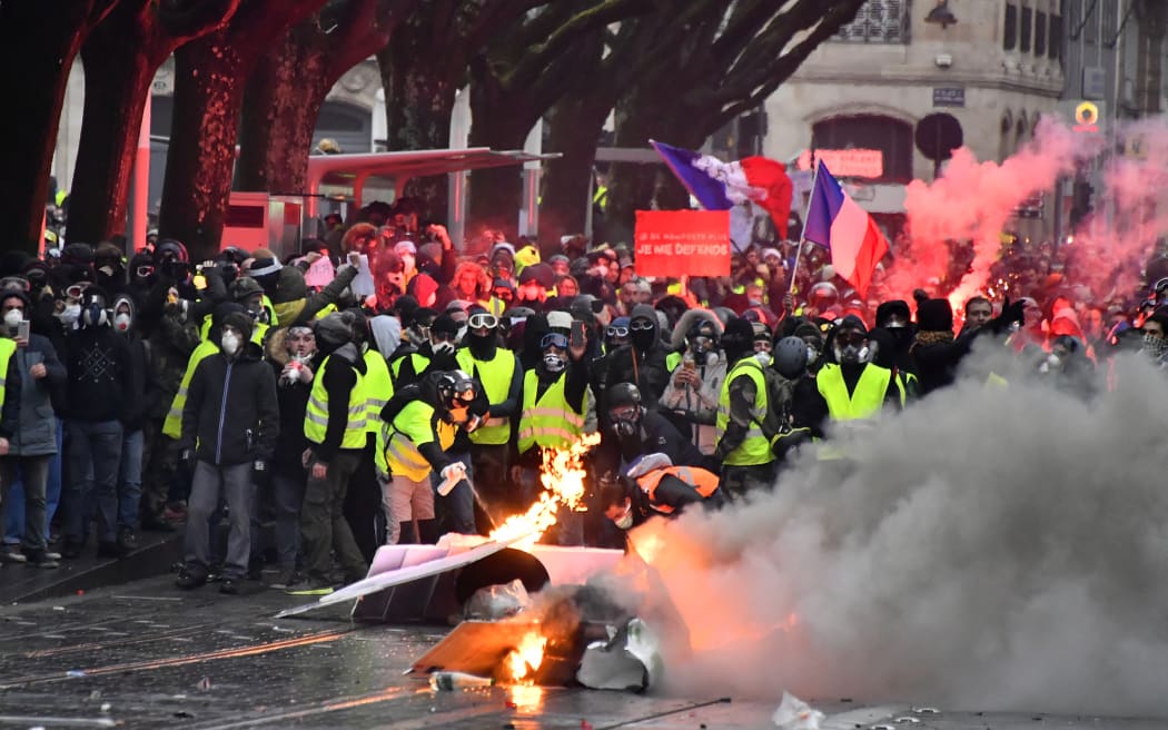 France s Macron responds to yellow vests with promise of reforms