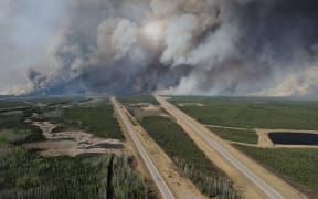 The Fort McMurray wildfire has spread across 100,000 hectares, with officials saying it could double in size today.