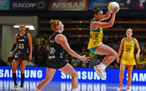 2018 Constellation Cup between the Australian Diamonds v Silver Ferns. Diamonds Kelsey Browne catches the ball in front of Silver Ferns Sam Sinclair.