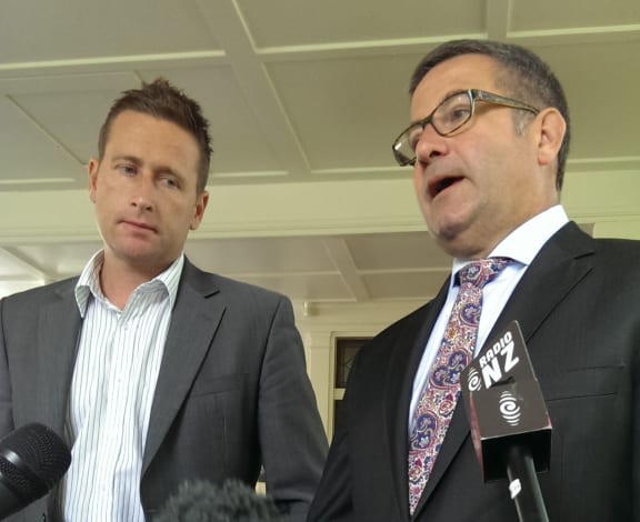 Investigator Tim McKinnel (left) and lawyer Jonathan Krebs.