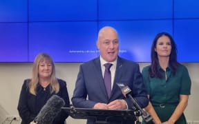 Tertiary Education spokesperson Penny Simmonds, National Party leader Christopher Luxon, and Education spokesperson Erica Stanford are announcing plans to revive international students.