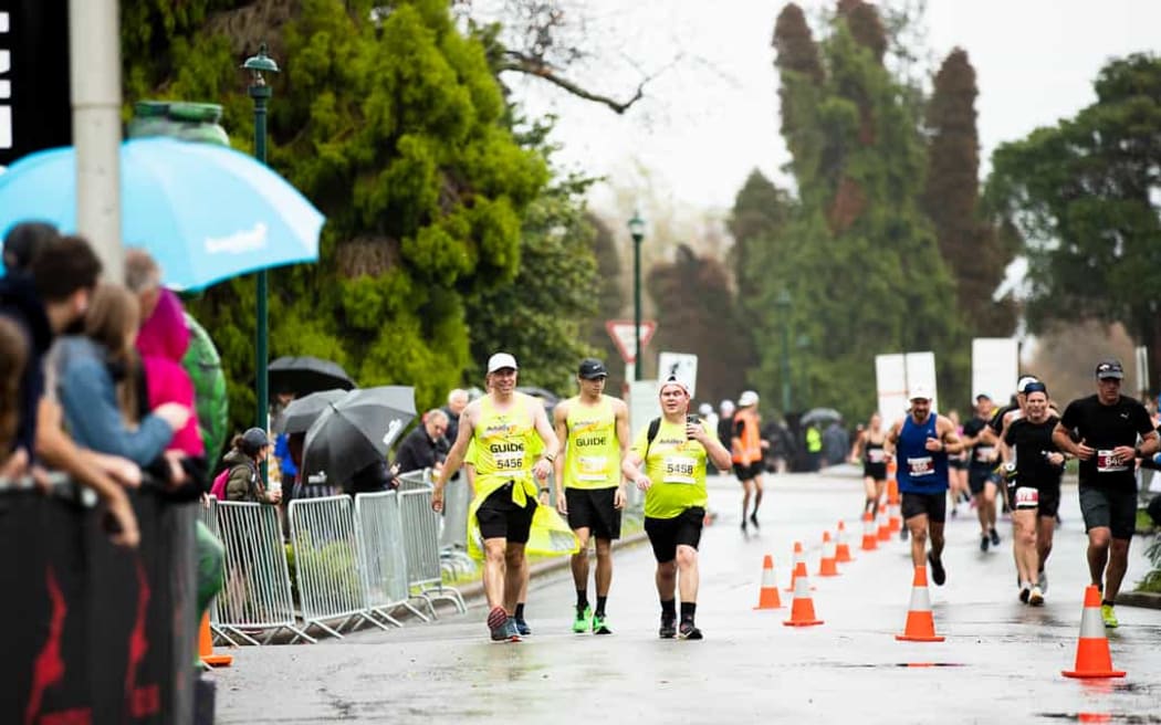 Achilles International New Zealand helps empower runners with disabilities.