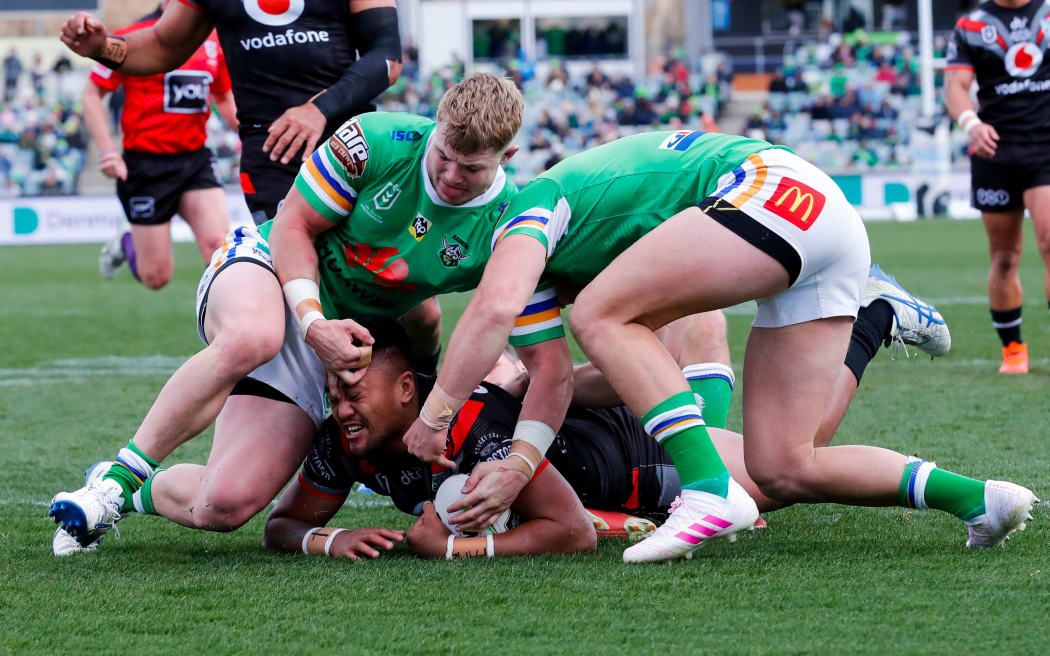 Canberra's Hudson Young (left) has been banned for eight games for eye gouging.
