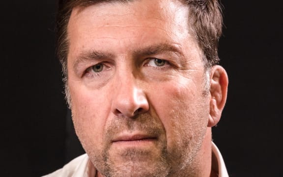 A close up photo of John Daniell, producer, writer and host of Fair Game: Pacific Rugby Against the World