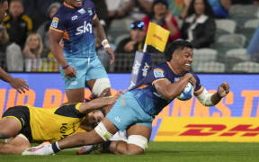 Moana Pasifika Miracle Faillagi scores his third try during the Super Rugby Pacific match, Moana Pasifika v Hurricanes, North Harbour Stadium, Auckland.