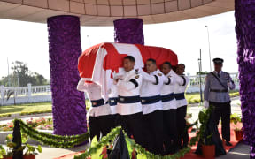 'Akilisi Pohiva is carried into the St George Govt Building