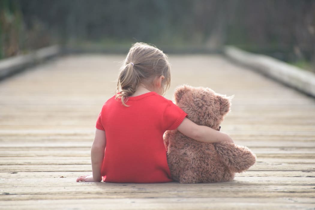 Child with teddybear