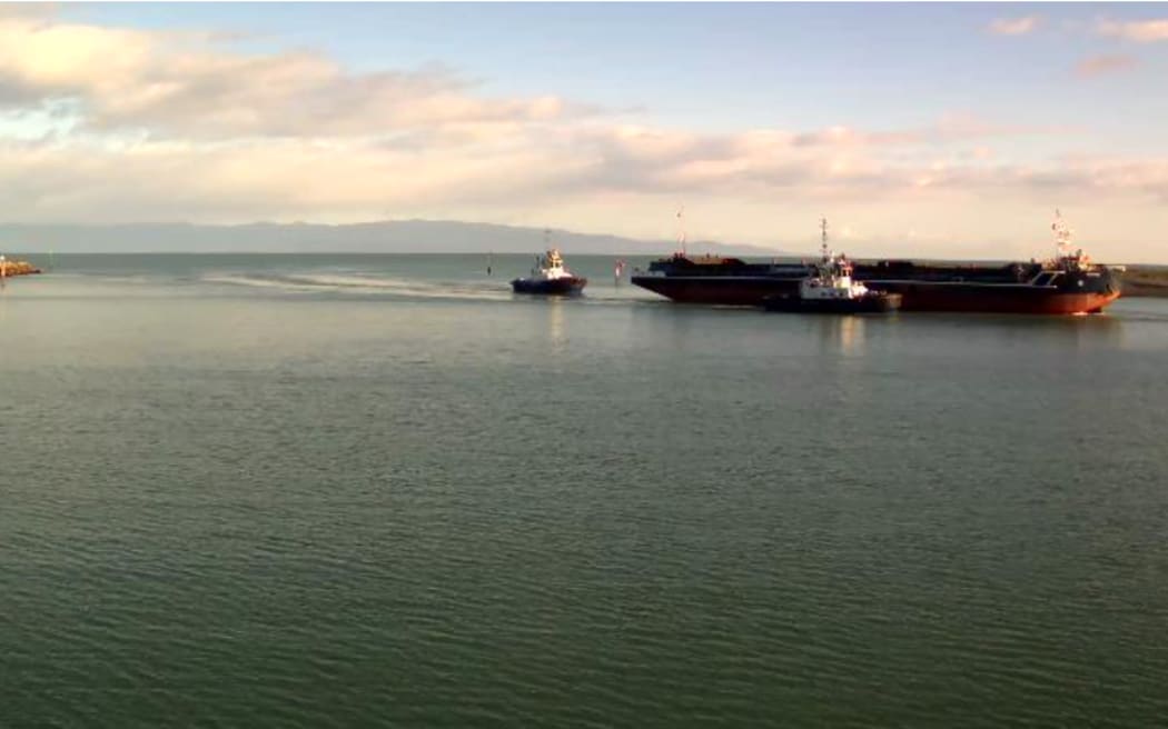 The Manahau barge is now detained at Port Nelson after being towed more than 300 kilometres from Westport. It was refloated last Friday after grounding on Carters Beach just before midnight on the previous Saturday.