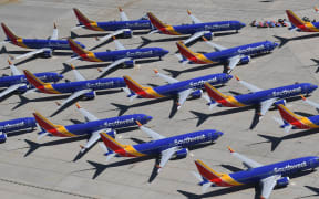 Southwest Airlines Boeing 737 MAX aircraft are parked on the tarmac after being grounded.