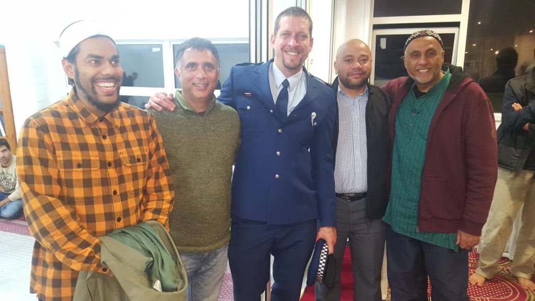 Raarif Rasheed, NZMA president Ikhlaq Kashkari with officer Rob Stanton and Constable Tavea Tavea and Avondale Islamic Centre secretary Omar Fahmy.