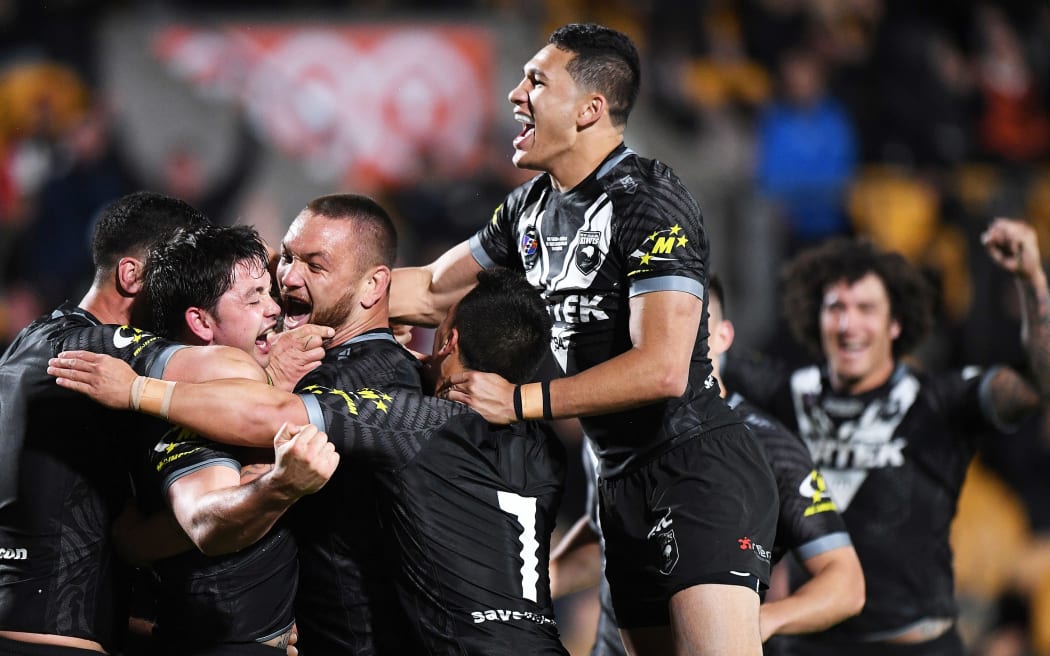 The Kiwis celebrate scoring during their last encounter against the Kangaroos, which New Zealand won 26-24.