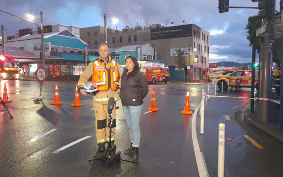 FENZ Wellington district manager Nick Pyatt, left, and Wellington mayor Tory Whanau, right, speak to media from the scene of the fire.