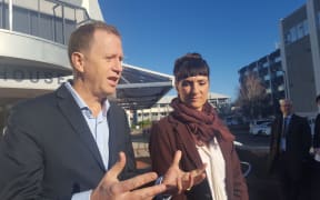 Greenpeace NZ executive director Russel Norman and volunteer Sara Howell outside Napier District Court 20 July 2018,