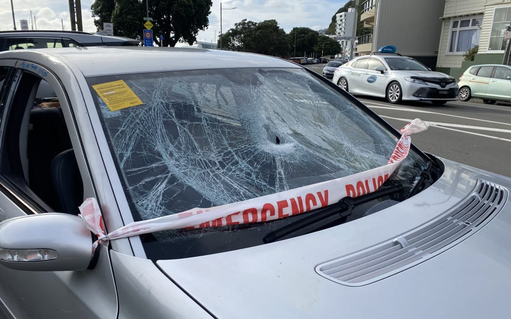 The damaged car sat damaged across multiple car parks on a busy Wellington street for more than a week.