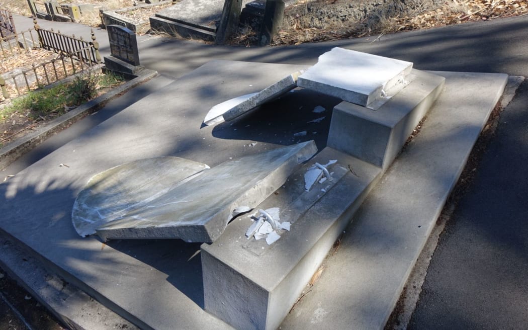 Two of the damaged graves in the Jewish section of Dunedin's Southern Cemetery.