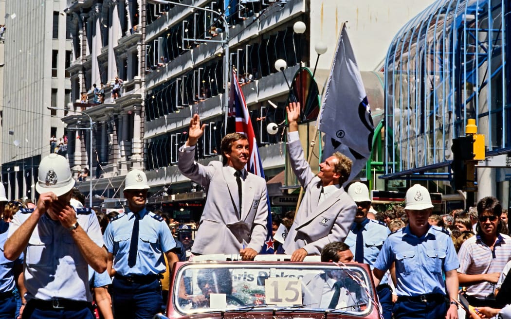 Michael Fay and Chris Dickson during a parade in Wellington, New Zealand to welcome back the New Zealand Challenge for the 1987 America's Cup raced in Fremantle, Australia.
12th February 1987.
Copyright photo: Bruce Jarvis / www.photosport.co.nz