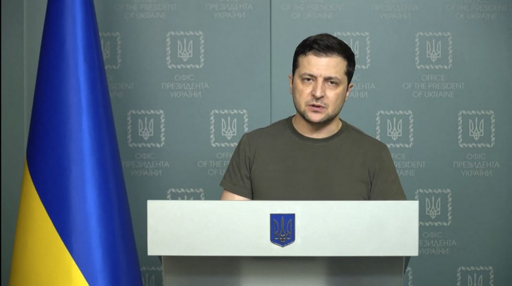 This handout video grab taken and released by the Ukraine Presidency press service on February 26, 2022 shows Ukrainian President Volodymyr Zelensky holding a briefing in Kyiv.