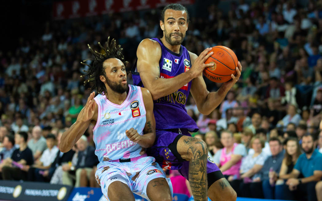 Sydney Kings Xavier Cooks and NZ Breakers Parker Jackson-Cartwright during the NBL