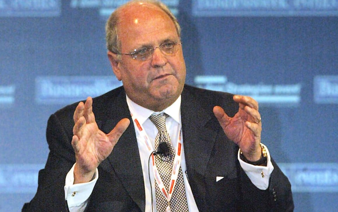 Former WTO director-general and former New Zealand prime minister, Mike Moore, gestures while speaking during a plenary session of the CEO Forum at the Grand Hyatt in Hong Kong, 06 November 2003.