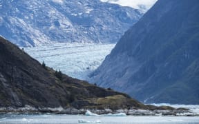 Retreating tidewater South Sawyer Glacier meets the rock, Tracy Arm, Southeast Alaska, United States of America, North America (Photo by Michael Nolan / Robert Harding RF / robertharding via AFP)