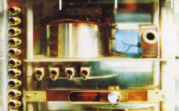 A close view of a 'Crystal Palace', showing the capacitance 'multiplexer drum' at the top, above the motor control levers and 'gearing'.