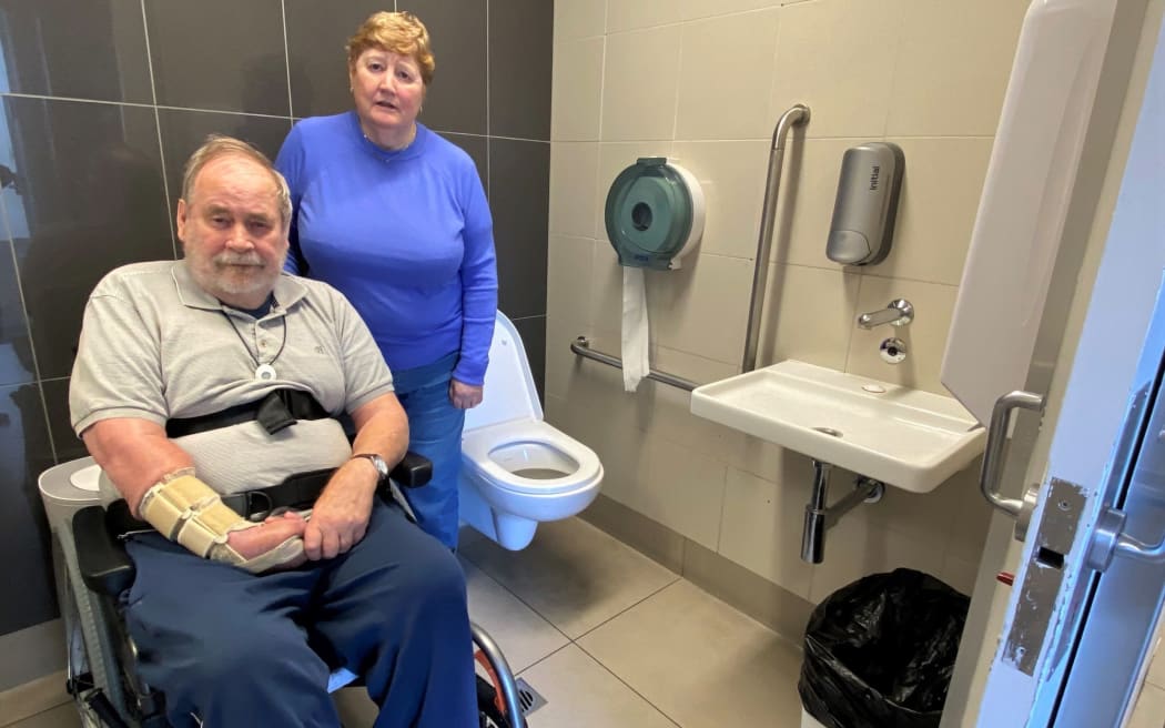 Jill Martin says most public toilets aren’t actually accessible and don’t provide enough room for her to manoeuvre her husband Alan in his wheelchair. Photo: Max Frethey/Nelson Weekly. [via LDR single use only]