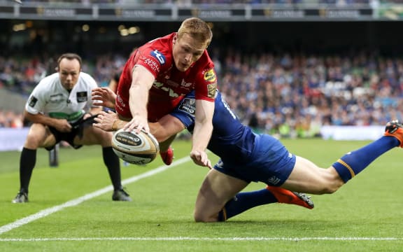 Johnny McNicholl scores a try for Welsh club Scarlets.