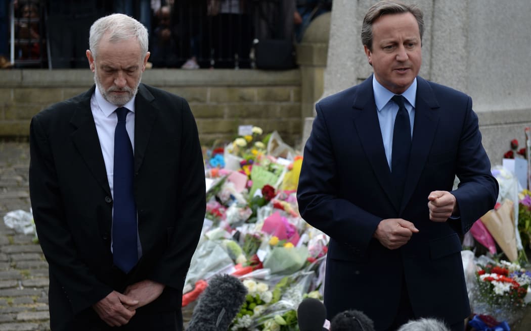 UK Labour leader Jeremy Corbyn and Prime Minister David Cameron paid respects to slain Labour MP Jo Cox in her home town of Birstall on Friday.
